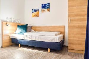 Postel nebo postele na pokoji v ubytování Sunny Hotel Straubing