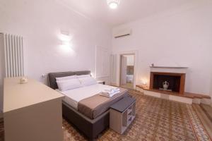Un pat sau paturi într-o cameră la Villa Dea