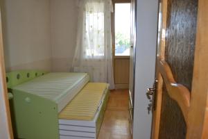Postel nebo postele na pokoji v ubytování Royal Telavi