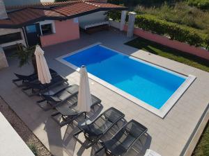 Bazén v ubytovaní Ferienhaus Bucic alebo v jeho blízkosti