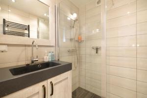 Ванна кімната в Appartement Veerse Kreek
