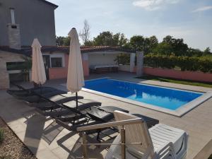 Bazén v ubytovaní Ferienhaus Bucic alebo v jeho blízkosti