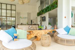 Posezení v ubytování Recenta Phuket Suanluang