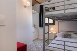 Postel nebo postele na pokoji v ubytování Flateli Rambla 5 3-1