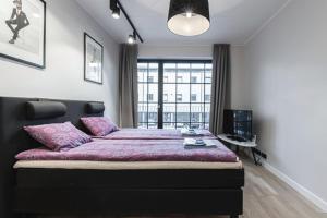 Postel nebo postele na pokoji v ubytování Baltic Accomodation 3 - Rumbi 4-12