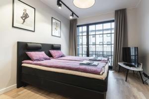 Postel nebo postele na pokoji v ubytování Baltic Accomodation 3 - Rumbi 4-12
