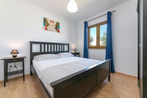 Postel nebo postele na pokoji v ubytování Grebac