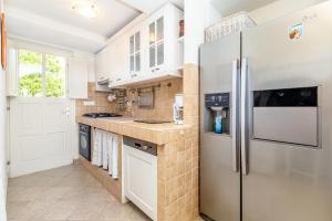 Kuchyň nebo kuchyňský kout v ubytování Holiday house TRSJA