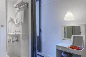 Kylpyhuone majoituspaikassa Hotel Palermo