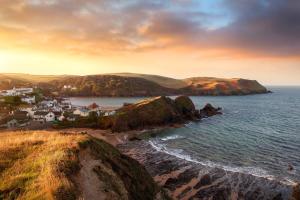 a view of a small town on the coast at Hope & Anchor in Hope Cove