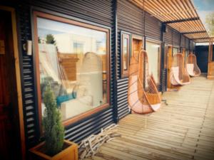 a store front with a row ofurnedurnedurned at DT Loft in Puerto Natales