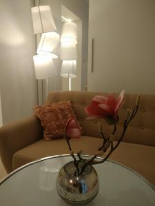 Część wypoczynkowa w obiekcie Apartament 100 Apartamenty No 1 Ogród w Centrum