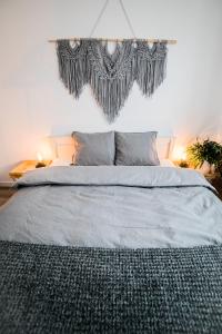 Llit o llits en una habitació de Apartament Alternatywny