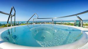 a hot tub on the roof of a building at Bull Eugenia Victoria & Spa in Playa del Ingles +76 photos