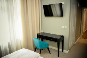 TV a/nebo společenská místnost v ubytování Villa Ljiljana