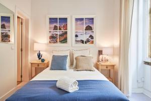 Postel nebo postele na pokoji v ubytování Praça da Figueira Elegance by MSapartments