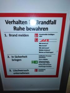 a sign for a britishrailrailrailrailrailrailrailrailrence at Ferienwohnung mit kleinem Garten in Sonnenbühl