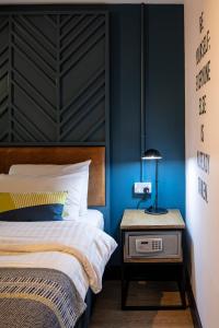 Cama ou camas em um quarto em Latroupe Jacobs Inn