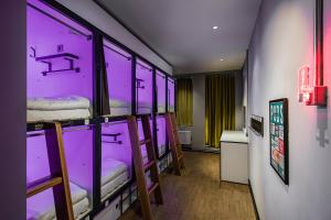 Cama ou camas em um quarto em Latroupe Jacobs Inn