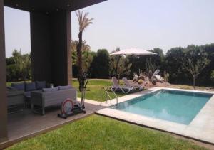 Piscina di Palms Edge Villas avec Piscine & Jardin Privés o nelle vicinanze
