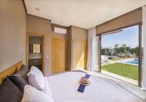 Bazén v ubytování Palms Edge Villas avec Piscine & Jardin Privés nebo v jeho okolí