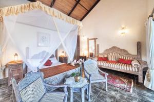 Postel nebo postele na pokoji v ubytování The Maji Beach Boutique Hotel -Adults Only + 37 fotografií