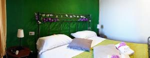 
A bed or beds in a room at B&B Le Undici Lune
