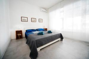 Posteľ alebo postele v izbe v ubytovaní Casa4Casa