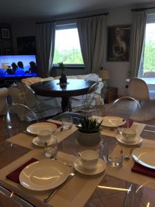 TV a/nebo společenská místnost v ubytování Sentirsi a casa