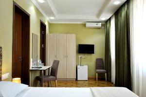 TV a/nebo společenská místnost v ubytování Hotel Frida