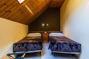 Postel nebo postele na pokoji v ubytování Apartamentos Turisticos Poblado