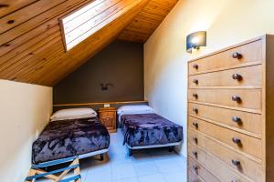 Postel nebo postele na pokoji v ubytování Apartamentos Turisticos Poblado