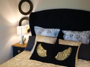 Posteľ alebo postele v izbe v ubytovaní Norte de Santillana Villas - Apartamentos