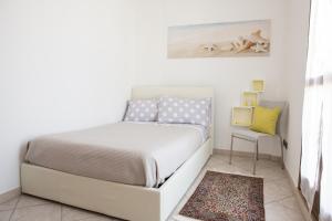 A bed or beds in a room at Viona Apartments