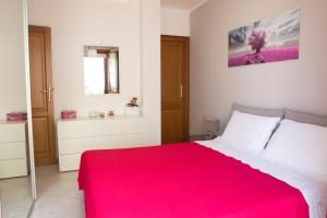 A bed or beds in a room at Viona Apartments