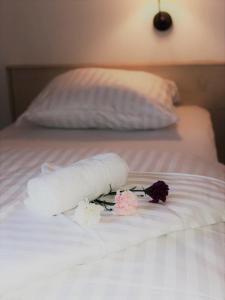Postel nebo postele na pokoji v ubytování A&M Hotel Barsinghausen + 18 fotografií