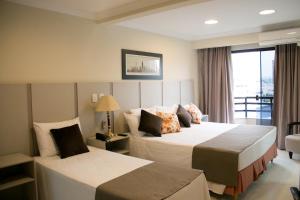 Voodi või voodid majutusasutuse Hotel Ferraz toas
