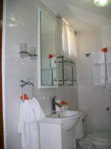 Ett badrum på Ideal Villa Hotel