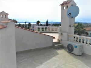 Balkon lub taras w obiekcie VILLA DOS-LAGOS
