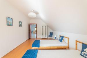 Posteľ alebo postele v izbe v ubytovaní Kamilla Villa