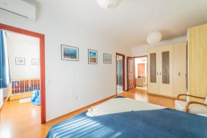 Posteľ alebo postele v izbe v ubytovaní Kamilla Villa