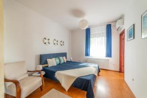 Posteľ alebo postele v izbe v ubytovaní Kamilla Villa