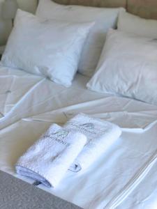 A bed or beds in a room at M Apartments, Kallikratia