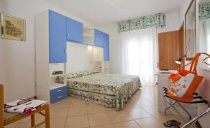 Postel nebo postele na pokoji v ubytování Hotel Fabris