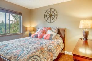 a bedroom with a bed and a window at Springs Haven in Pagosa Springs