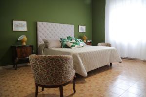 Giường trong phòng chung tại Casa Cristina