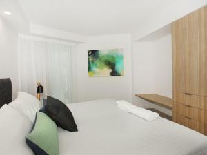 Postel nebo postele na pokoji v ubytování Sirocco 201