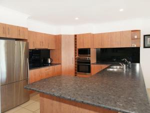 A kitchen or kitchenette at St Lucia 11 - Four Bedroom Canal Home with Pool