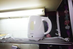 大阪市にあるEX Tenjinnomori Apartment 104の白い器具
