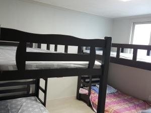 Postel nebo postele na pokoji v ubytování Guest House Manna